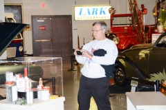 Prez Mark taking a picture of a display at the Studebaker museum