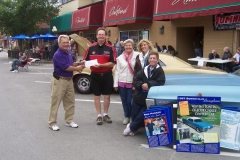 Grand Prix Chapter presented check for $1225 to Tim Dye for the Ron Panzer Memorial