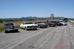 Good place for a car photo with Devils Tower in background, too bad the bus & motorhome had to get in the shot.