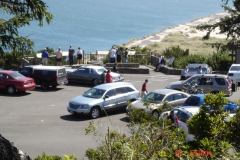 View down to the parking lot from the Yaquina Bay Lighthouse