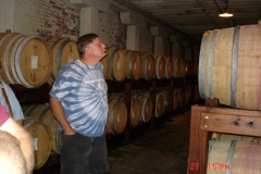 A.J. Koszi checking out the wine barrels